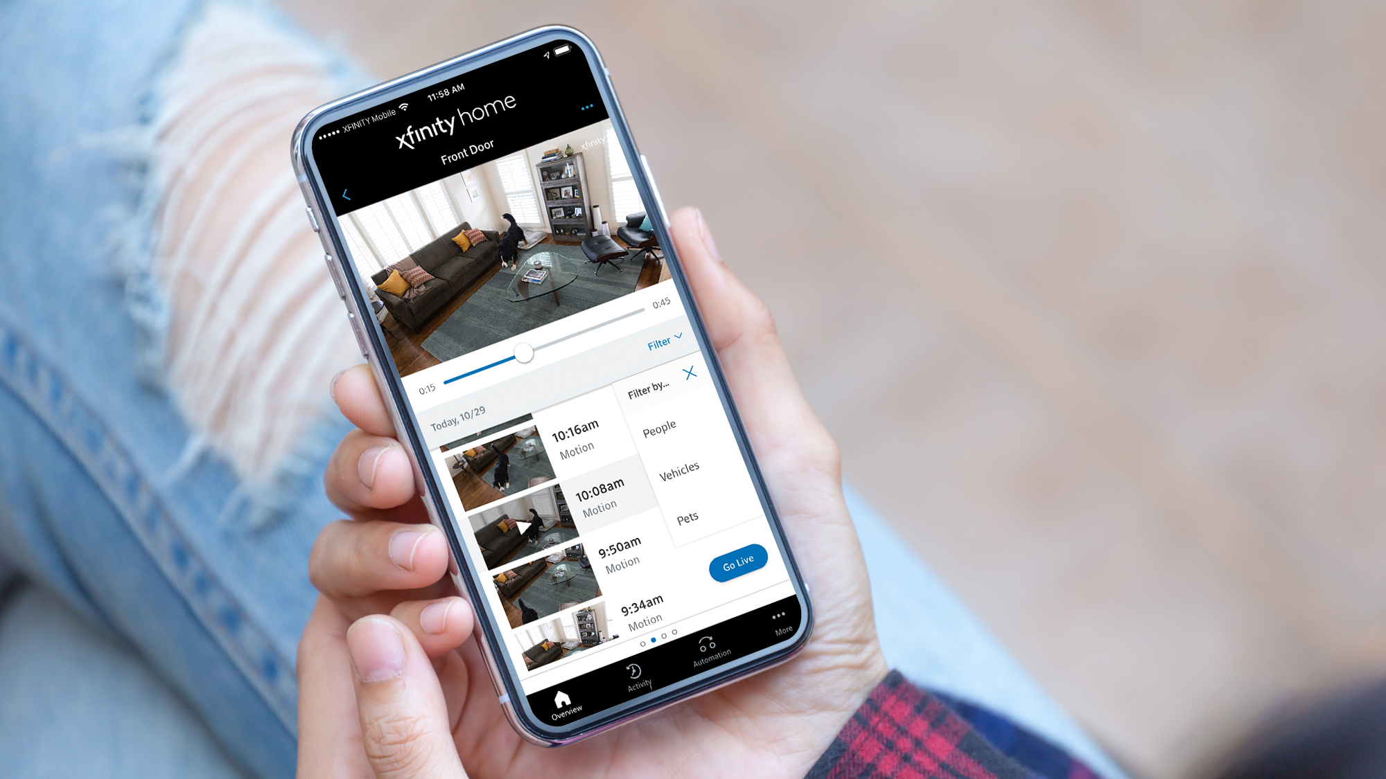 Xfinity camera pets filter on a cellphone being held by a woman