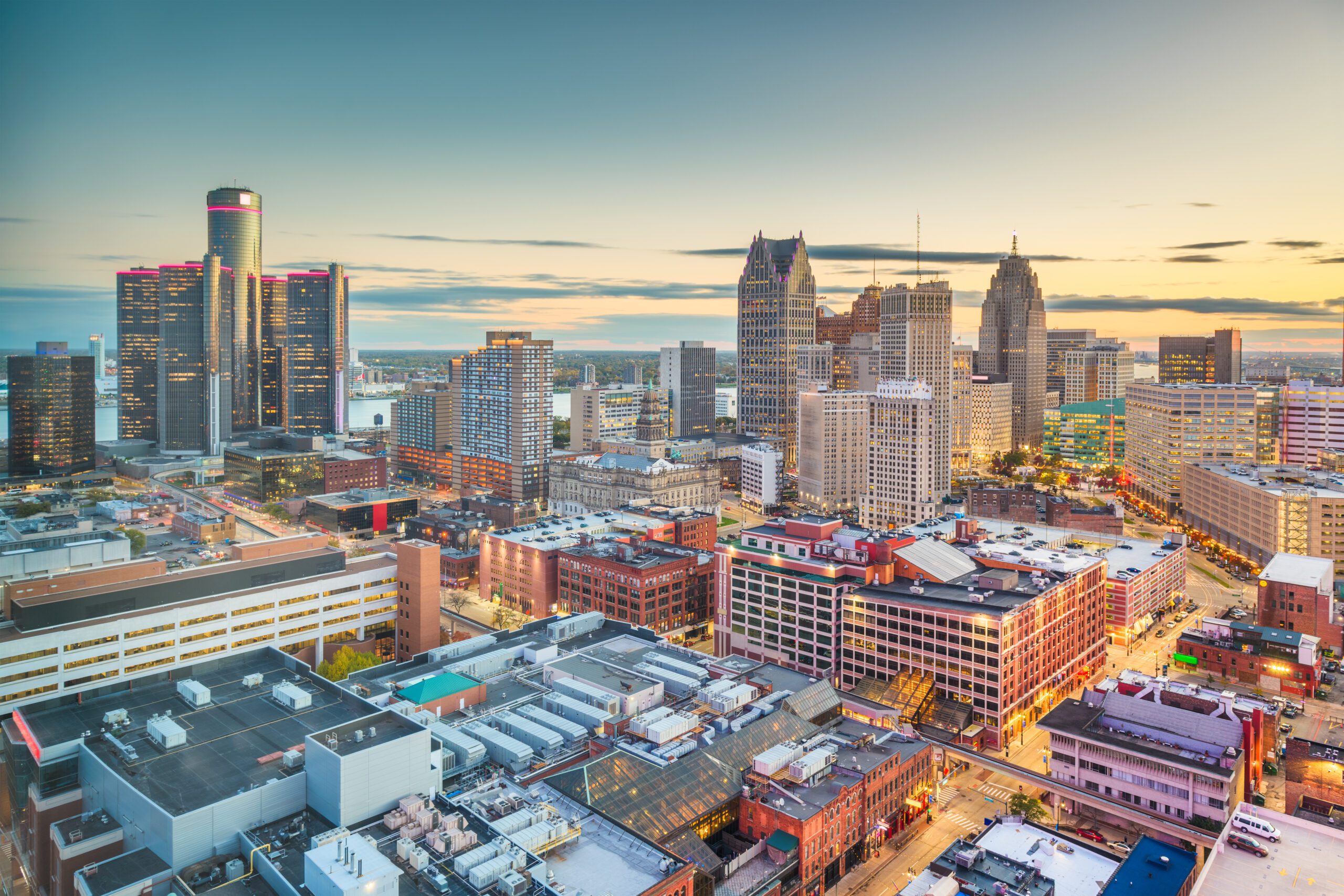 Detroit, Michigan, USA downtown skyline from above at dusk.